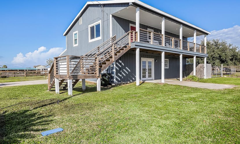 Inviting 2-story home near beach with deck, patio, W/D, board games, AC