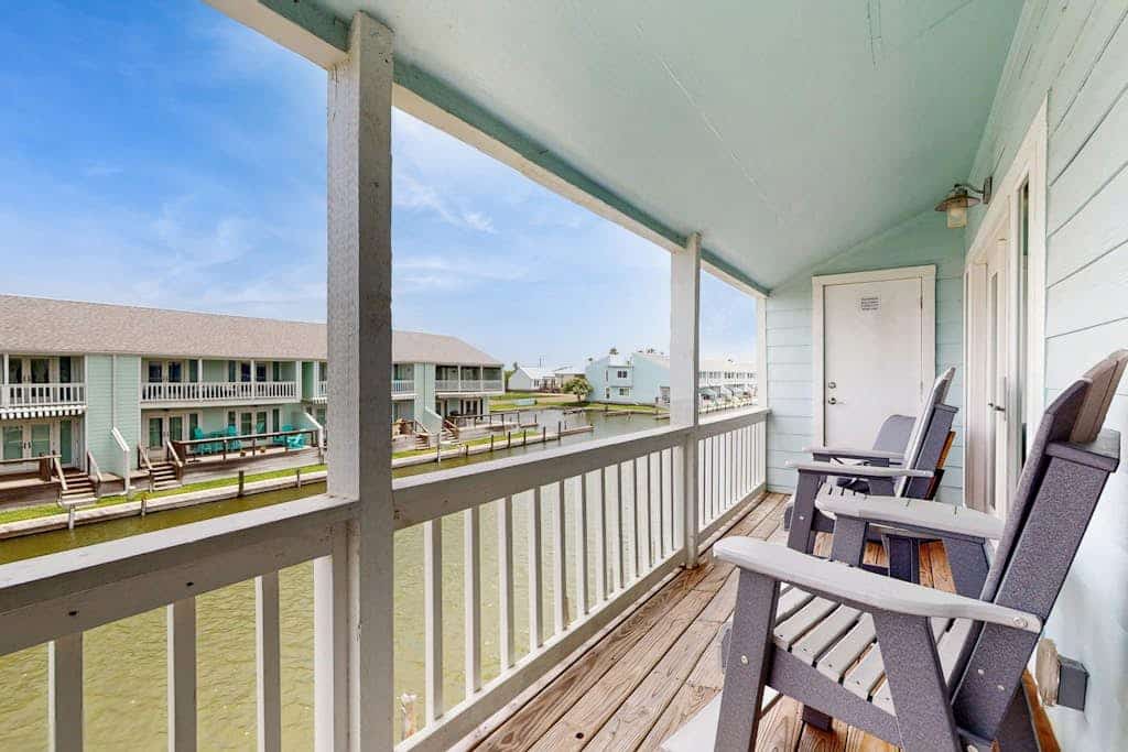 Inviting condo with private boat slip, pool, tennis, balcony, central AC, & W/D