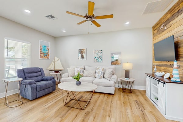 Inviting coastal home with shared pool and stocked pond