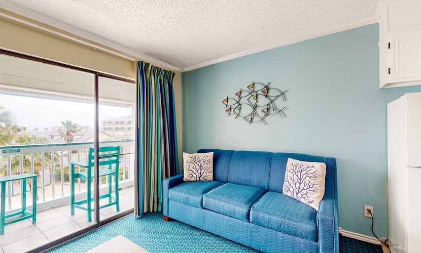 Beach-view condo steps from Babe’s Beach with pool, hot tub, balcony, & W/D