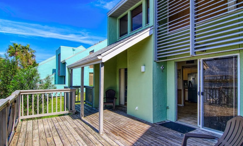 Waterfront condo with deck, bay views & pool - near beaches & dining