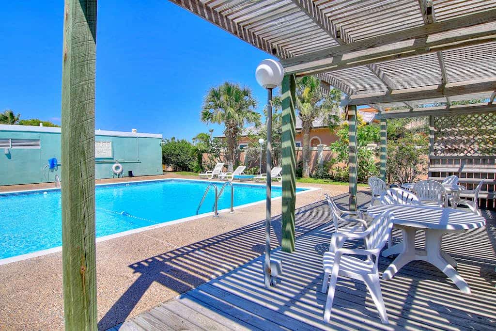 Waterfront condo with deck, bay views & pool - near beaches & dining