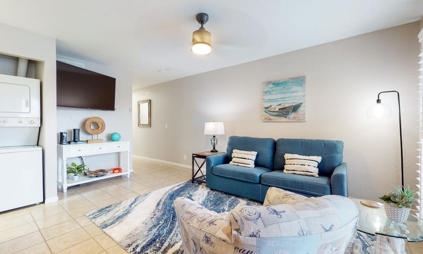 First-floor condo near Whitecap Beach with balcony, pool & dock