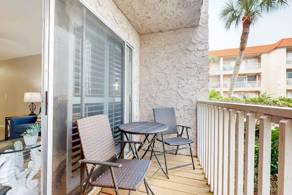 First-floor condo near Whitecap Beach with balcony, pool & dock