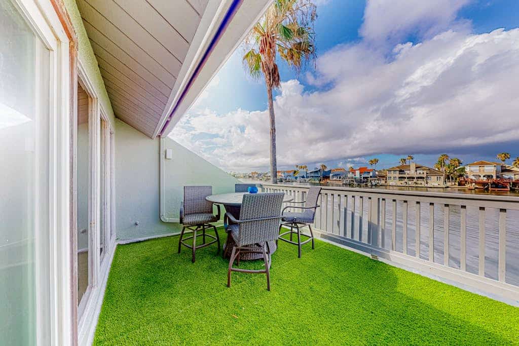 Water-view condo with docks, outdoor pool, near attractions