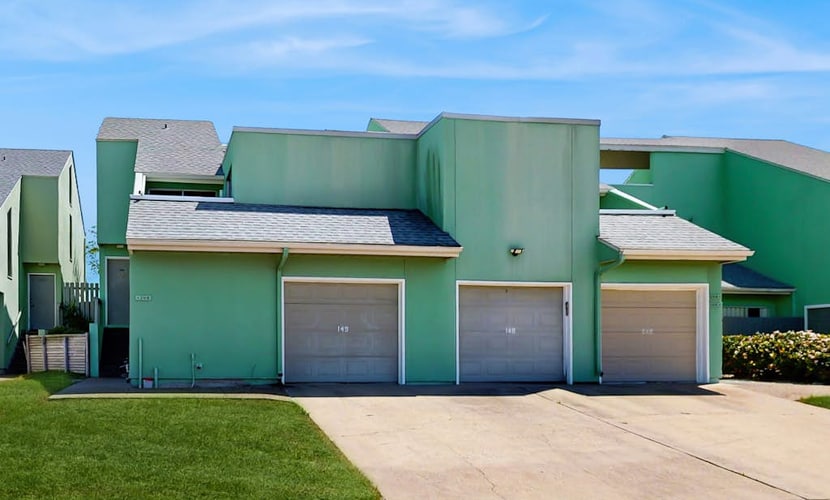 Bayfront condo with large deck, bay views, central AC, washer/dryer, and dock