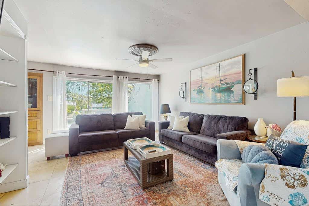 Bayfront condo with large deck, bay views, central AC, washer/dryer, and dock