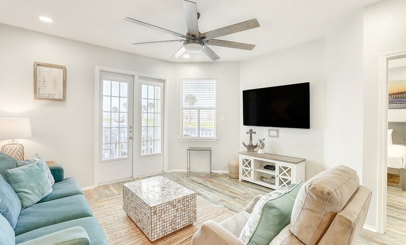 Updated beach condo with pool, sauna, patio & high-end appliances - dog-friendly