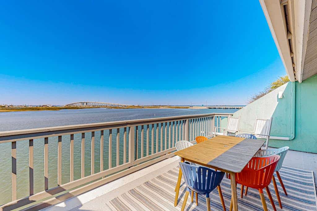 Waterfront condo with sunset views, boat access, & sparkling pool