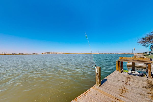 Waterfront condo with sunset views, boat access, & sparkling pool