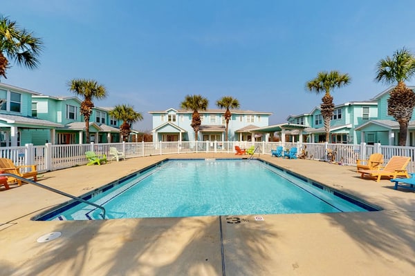 2-story home near the beach with outdoor pool, patio, washer/dryer, AC, & WiFi