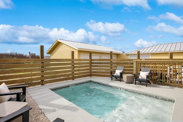 Comforting Port Aransas home with full kitchen, heated pool, patio, & balcony