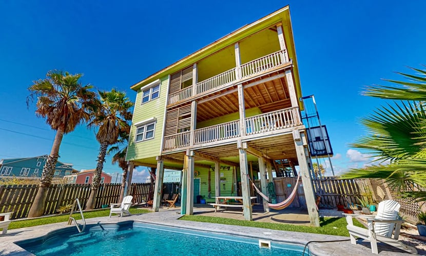 Dog-friendly, Gulf-view home with pool, fenced yard & grill - walk to the beach