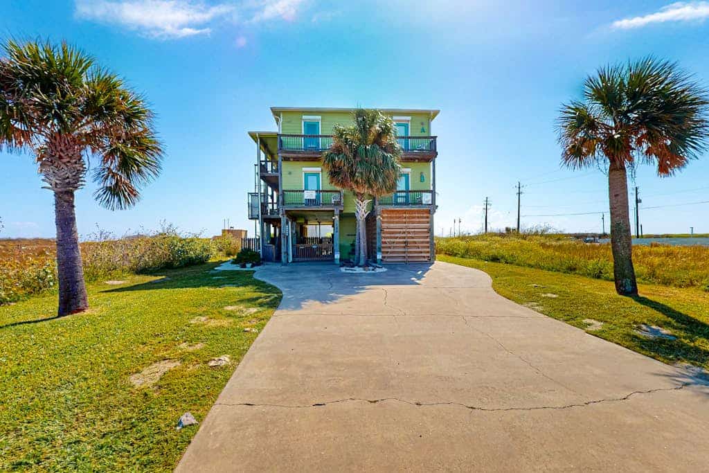 Dog-friendly, Gulf-view home with pool, fenced yard & grill - walk to the beach