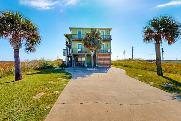 Dog-friendly, Gulf-view home with pool, fenced yard & grill - walk to the beach