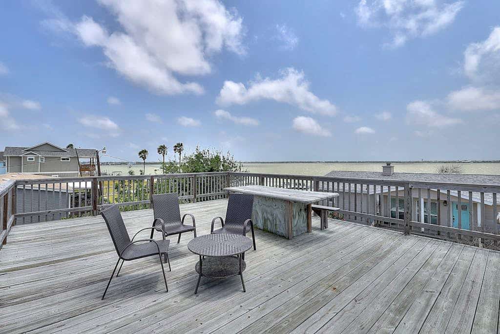 All-suite bay-view home with yard, kayak, & rooftop deck with panoramic views