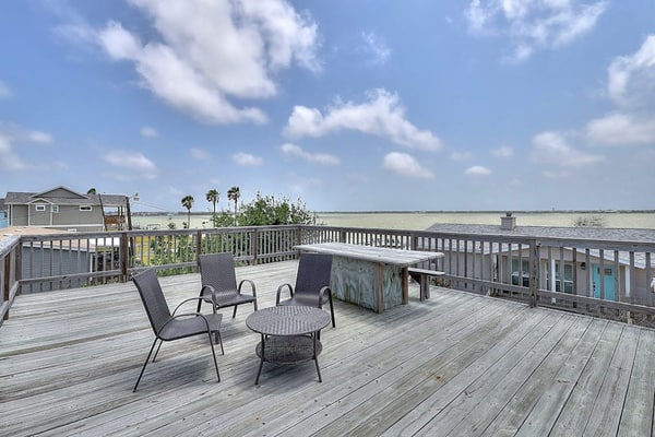 All-suite bay-view home with yard, kayak, & rooftop deck with panoramic views