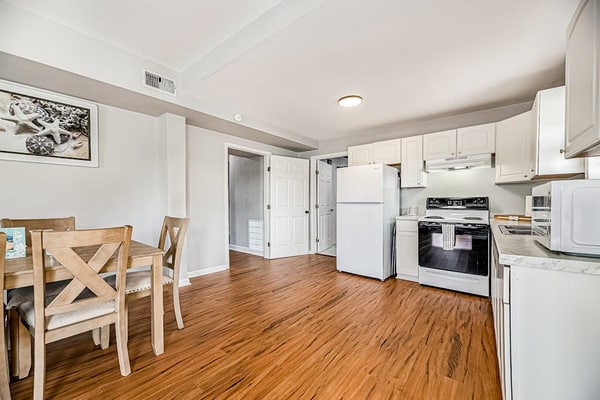 Spacious downstairs home near beach with patio, kitchen, board games, AC