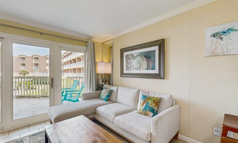 Snowbird-friendly condo with beach access, balcony, pool, & BBQ area