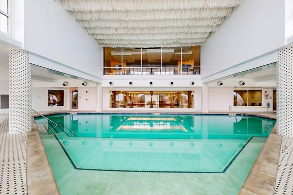 Beachfront condo with beach access and shared amenities