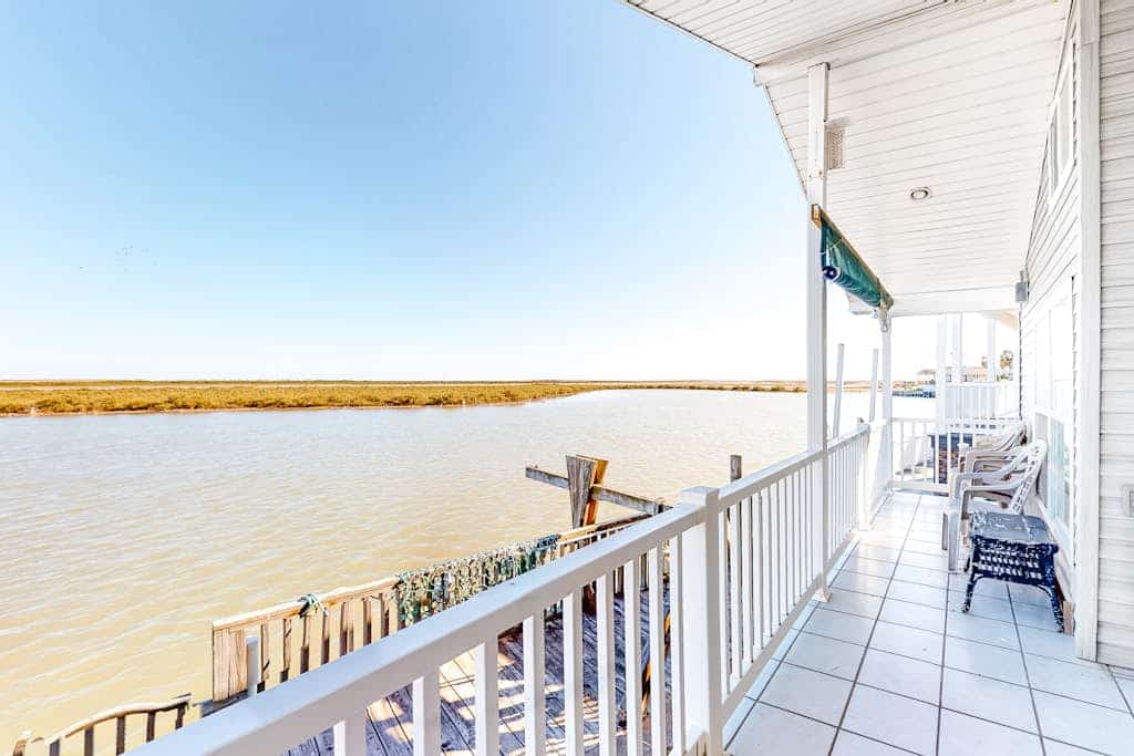 Charming waterfront house with heated pool, hot tub, & W/D - snowbird-friendly