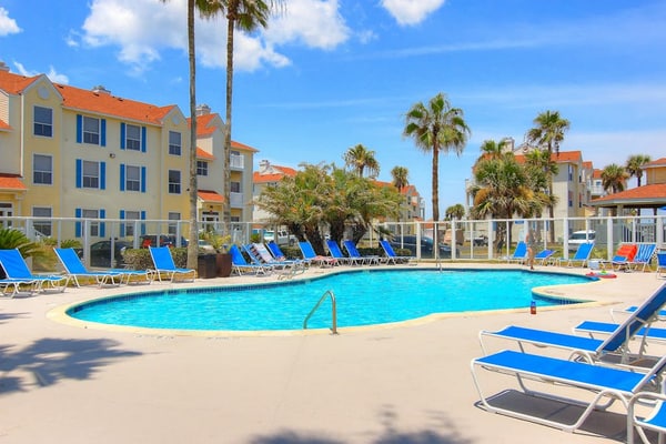 Partial Gulf view condo w/ a private balcony, shared pool, & hot tub - dogs OK