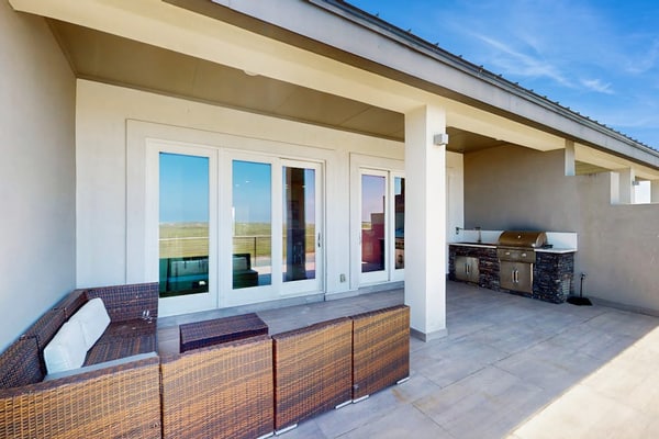Waterfront townhome with dock, canal view & fireplaces - walk to beach
