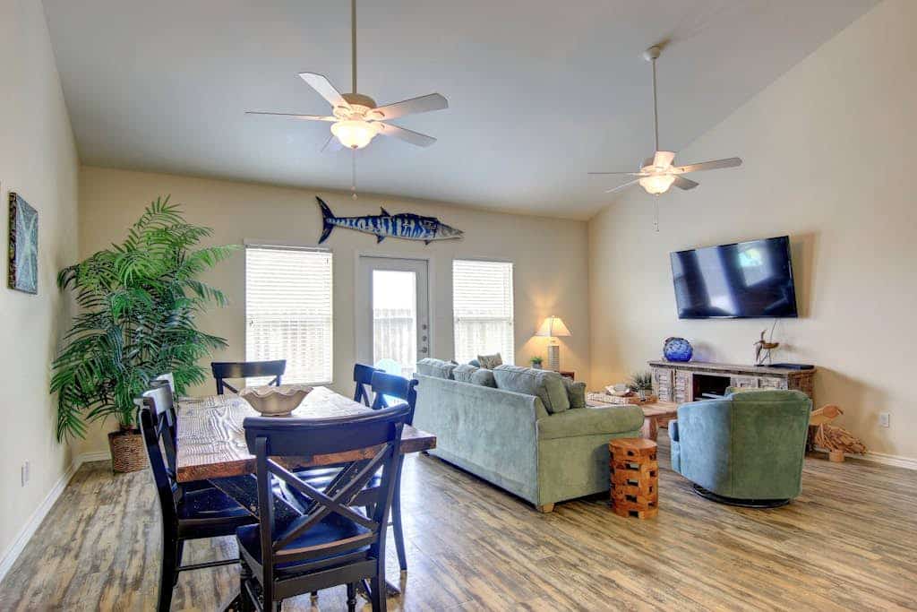 Dog-friendly townhome with pool, & patio - close to beach