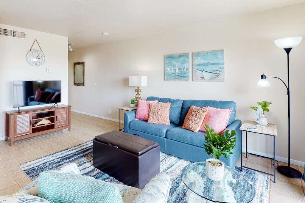Coastal Bend condo with water views, dock, pool, sun deck, balcony, & W/D