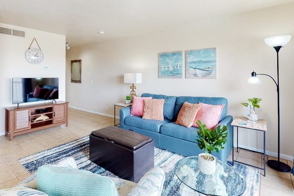 Coastal Bend condo with water views, dock, pool, sun deck, balcony, & W/D