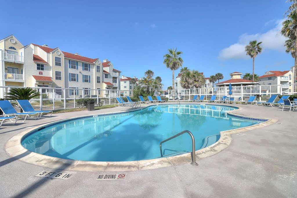 3rd-floor condo near the beach with water views, hot tub, heated pool, gym, AC