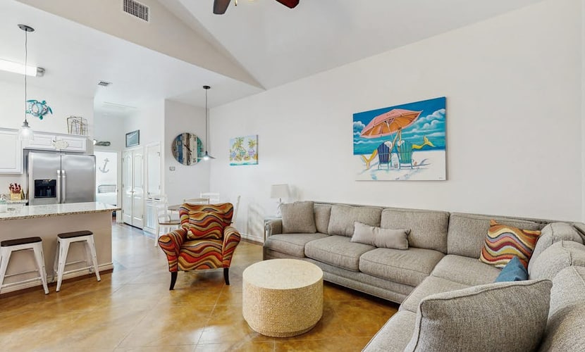 Cozy beach home with full kitchen, living space, WIFI, patio and shared pool