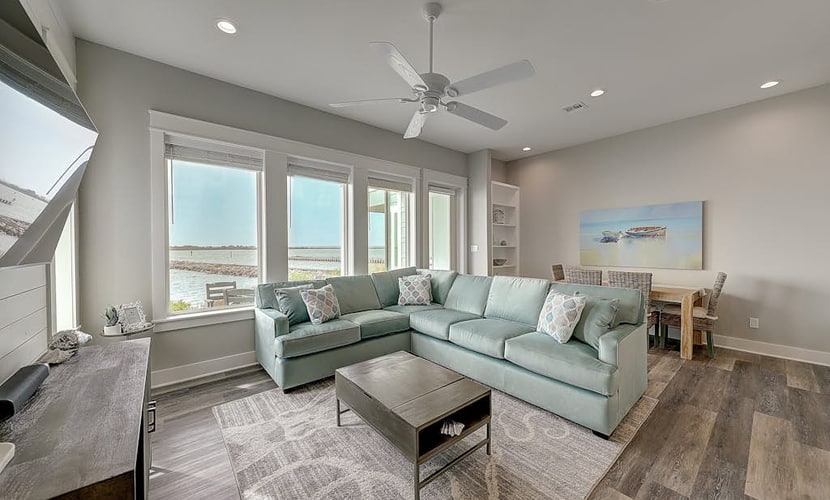 Waterfront haven with Bay views, patio, luxe suites, and shared dock and pool
