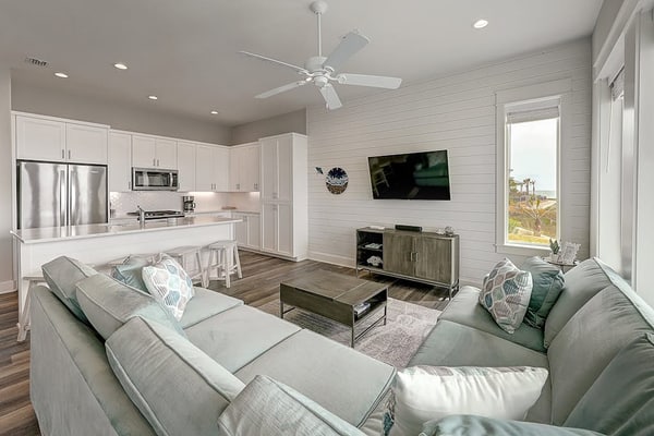 Waterfront haven with Bay views, patio, luxe suites, and shared dock and pool