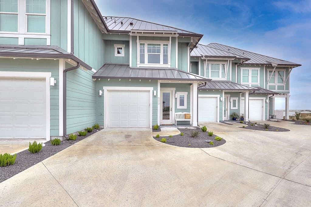 Waterfront haven with Bay views, patio, luxe suites, and shared dock and pool