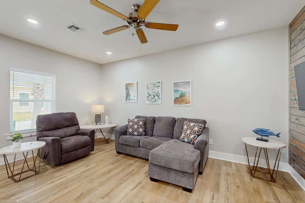 Inviting coastal home with shared pool and stocked pond