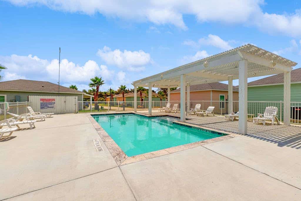 Inviting coastal home with shared pool and stocked pond