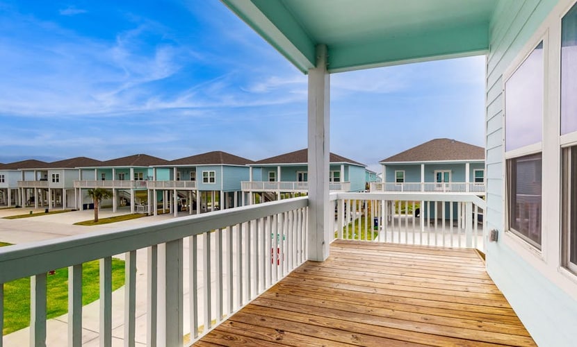Breezy dog-friendly home with on-site pool, washer/dryer & inviting deck/patio
