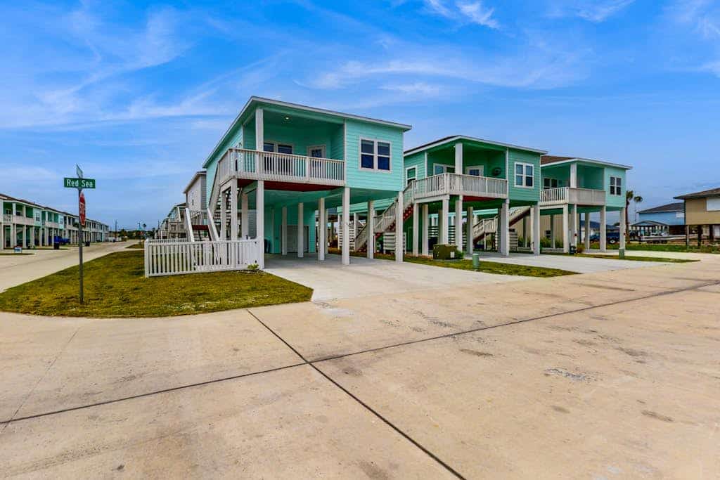 Breezy dog-friendly home with on-site pool, washer/dryer & inviting deck/patio