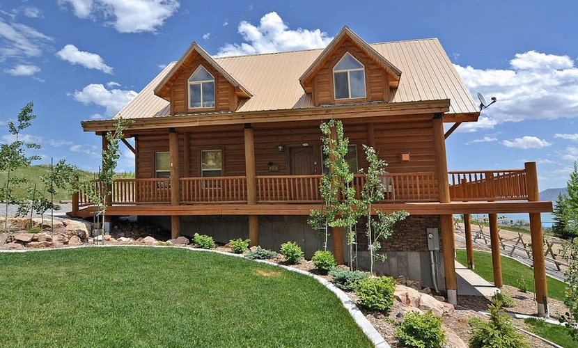 Rustic cabin with lake views from deck w/ grill, foosball, W/D, fireplace