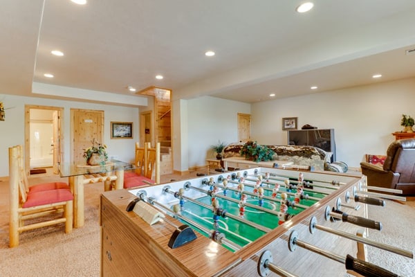 Rustic cabin with lake views from deck w/ grill, foosball, W/D, fireplace