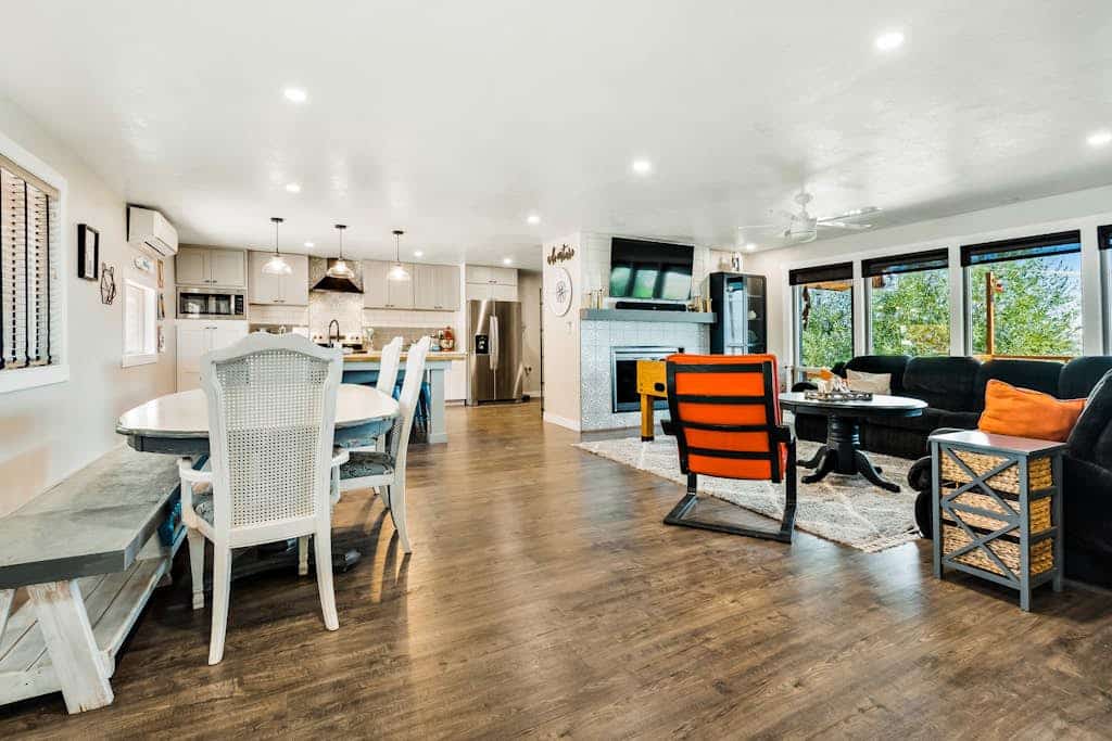 Single-level, lakefront getaway with mini-bar, furnished deck & mountain views
