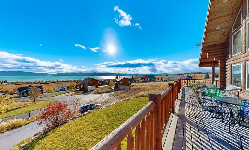 Genuine log cabin w/stunning lake views & boat parking