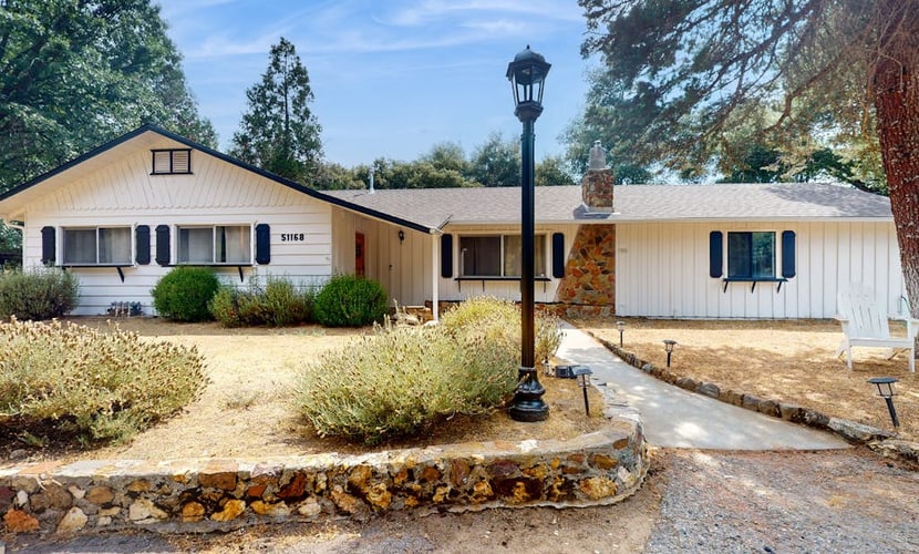 Serene home with spacious deck, game room, and nearby attractions