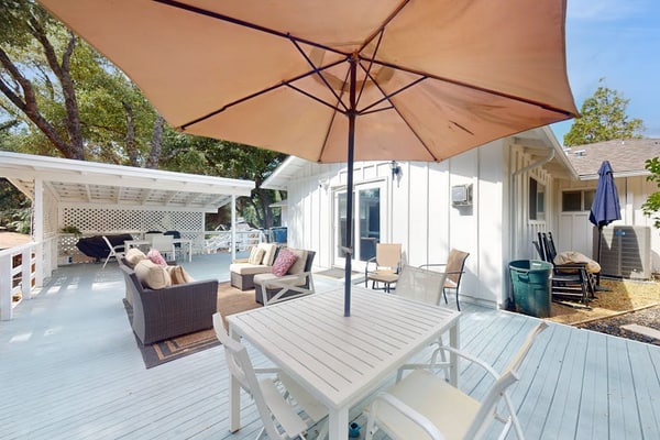 Serene home with spacious deck, game room, and nearby attractions