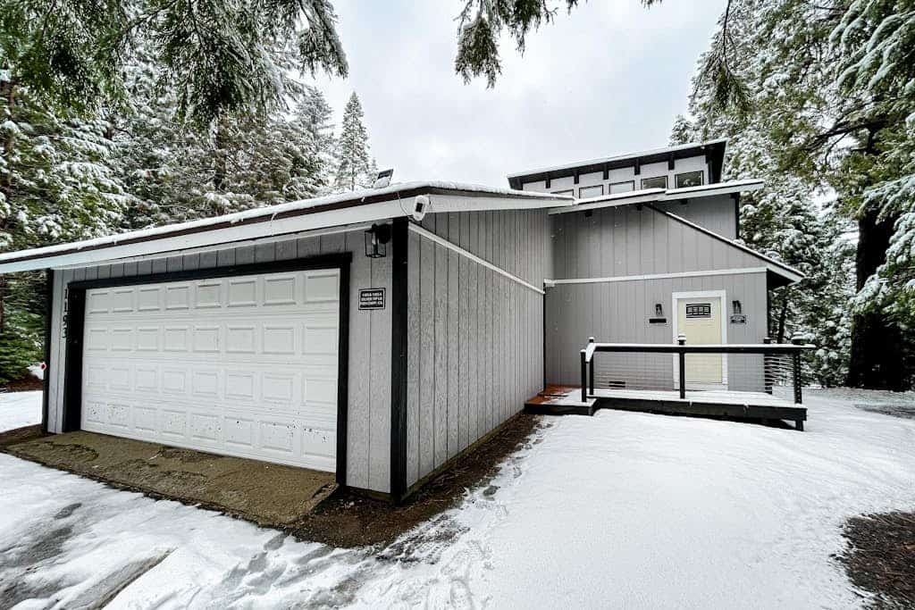 Modern lower unit duplex cabin with fireplace, balcony, & EV charger