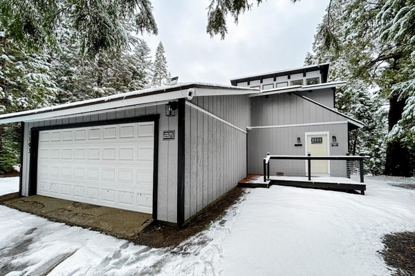 Modern lower unit duplex cabin with fireplace, balcony, & EV charger
