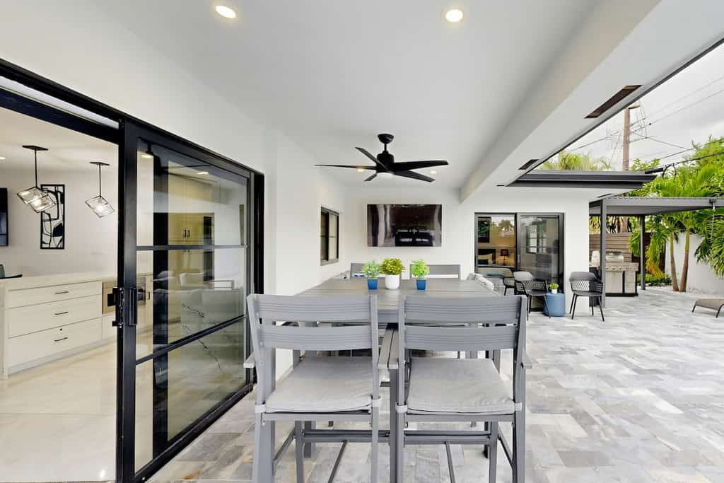 Stunning single level home with, heated pool, kitchen, & fully equipped BBQ area