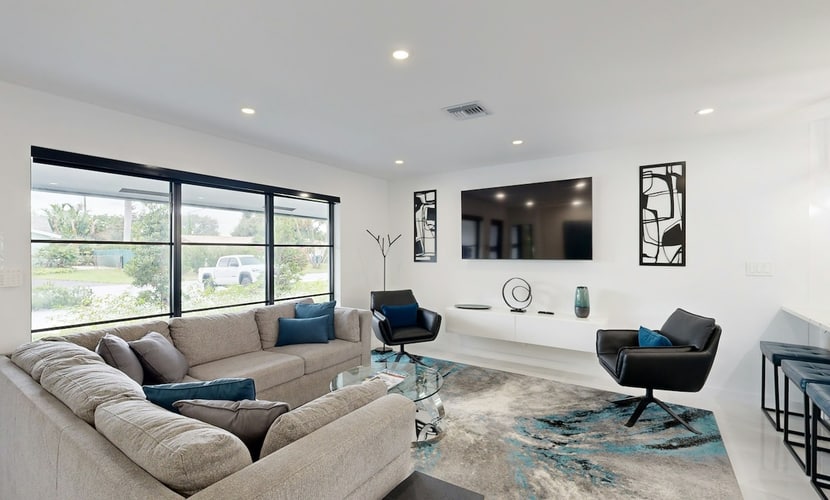 Stunning single level home with, heated pool, kitchen, & fully equipped BBQ area