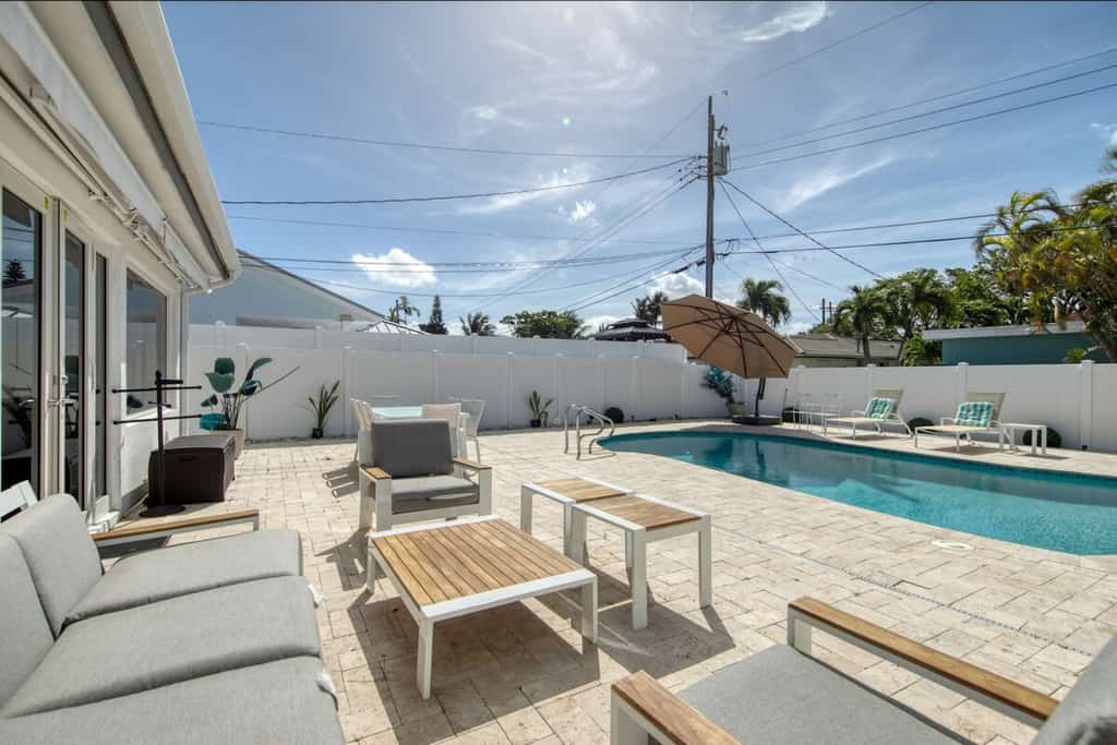 Fully-equipped home with pool, grill, streaming, children's items, W/D, & AC
